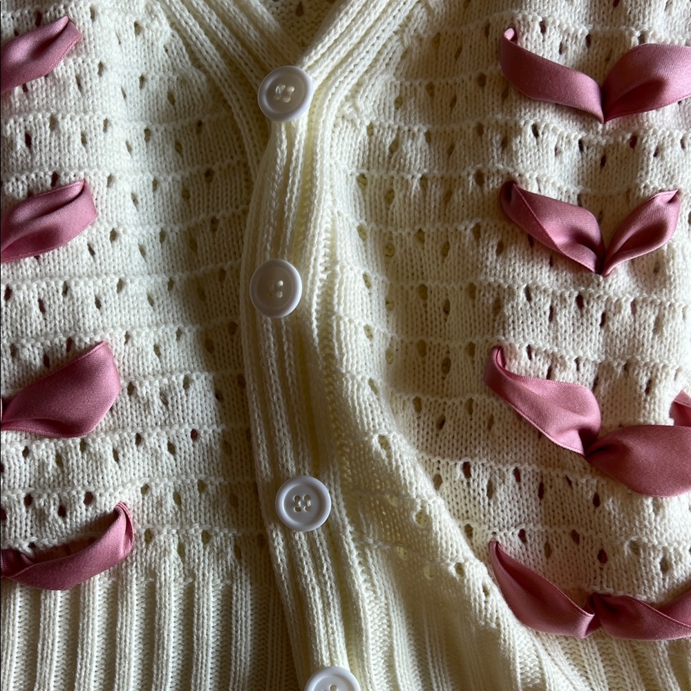Elegant Cream Cardigan with Pink Ribbon Accents - Picture 7 of 9
